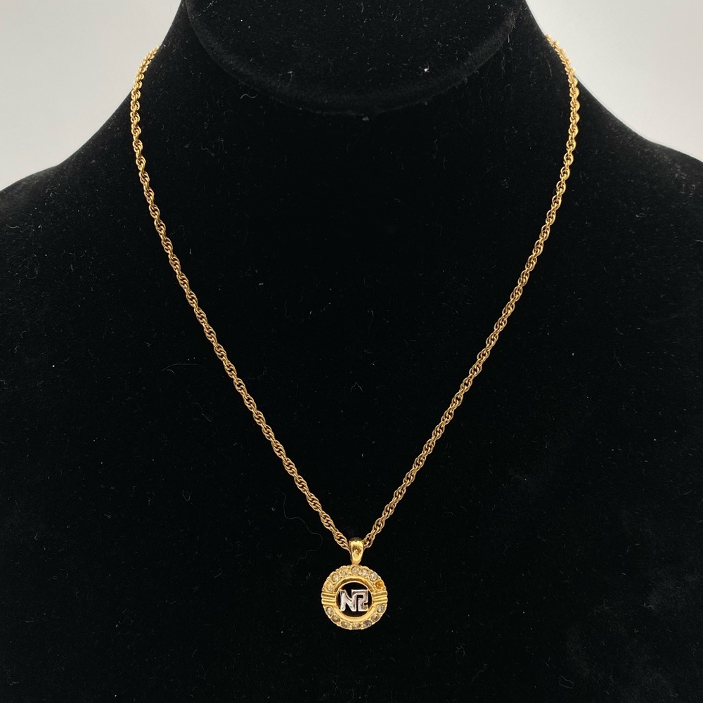Nina Ricci Logo & Rhinestone Gold Tone Pendant Necklace
